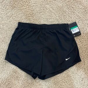 Black Nike shorts; size: girls XL
